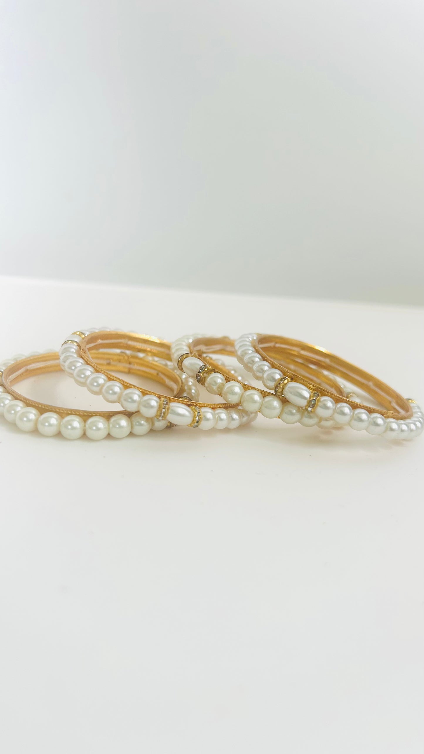 Set of 4 Gold Bangles with Pearls
