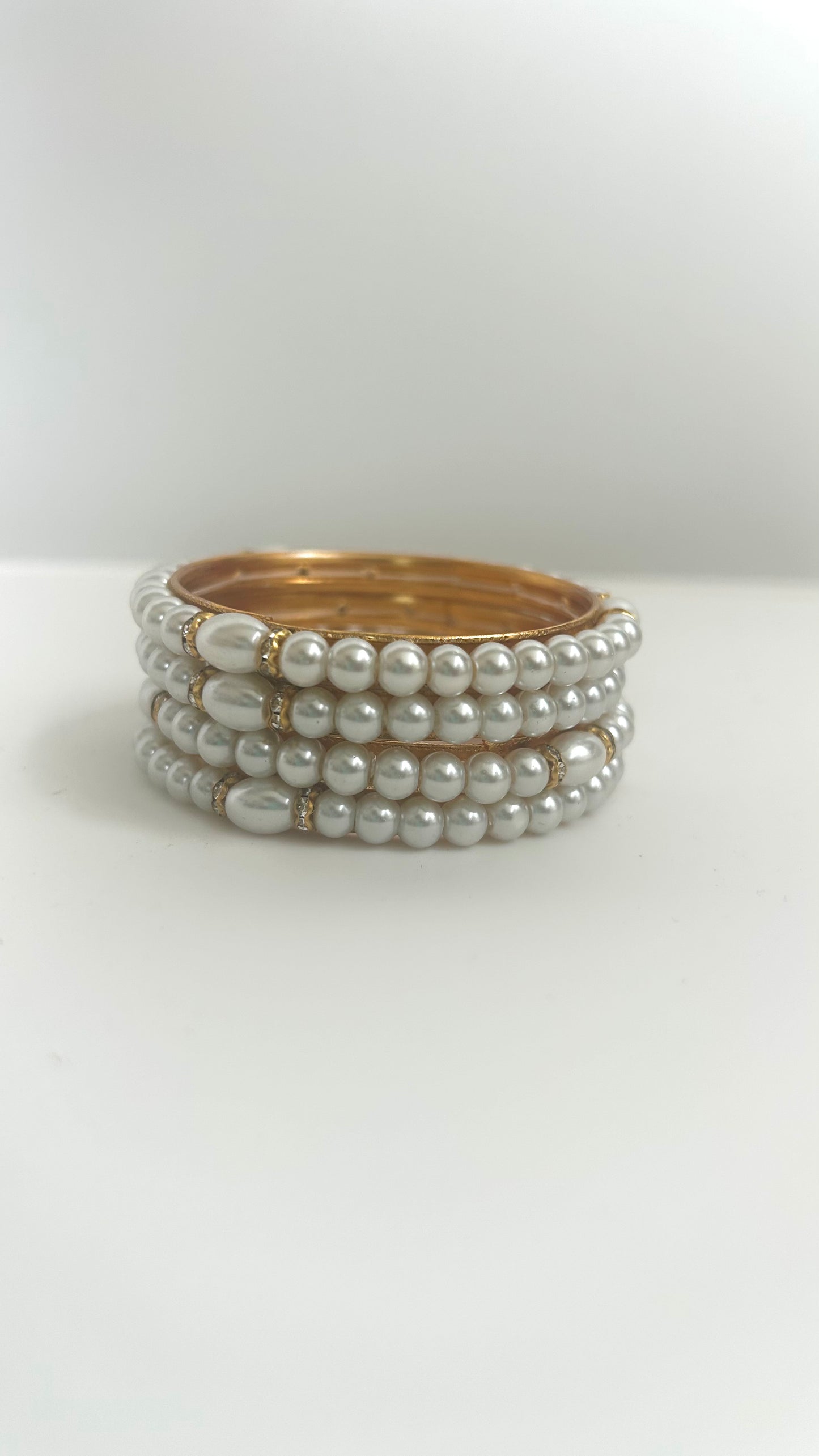 Set of 4 Gold Bangles with Pearls