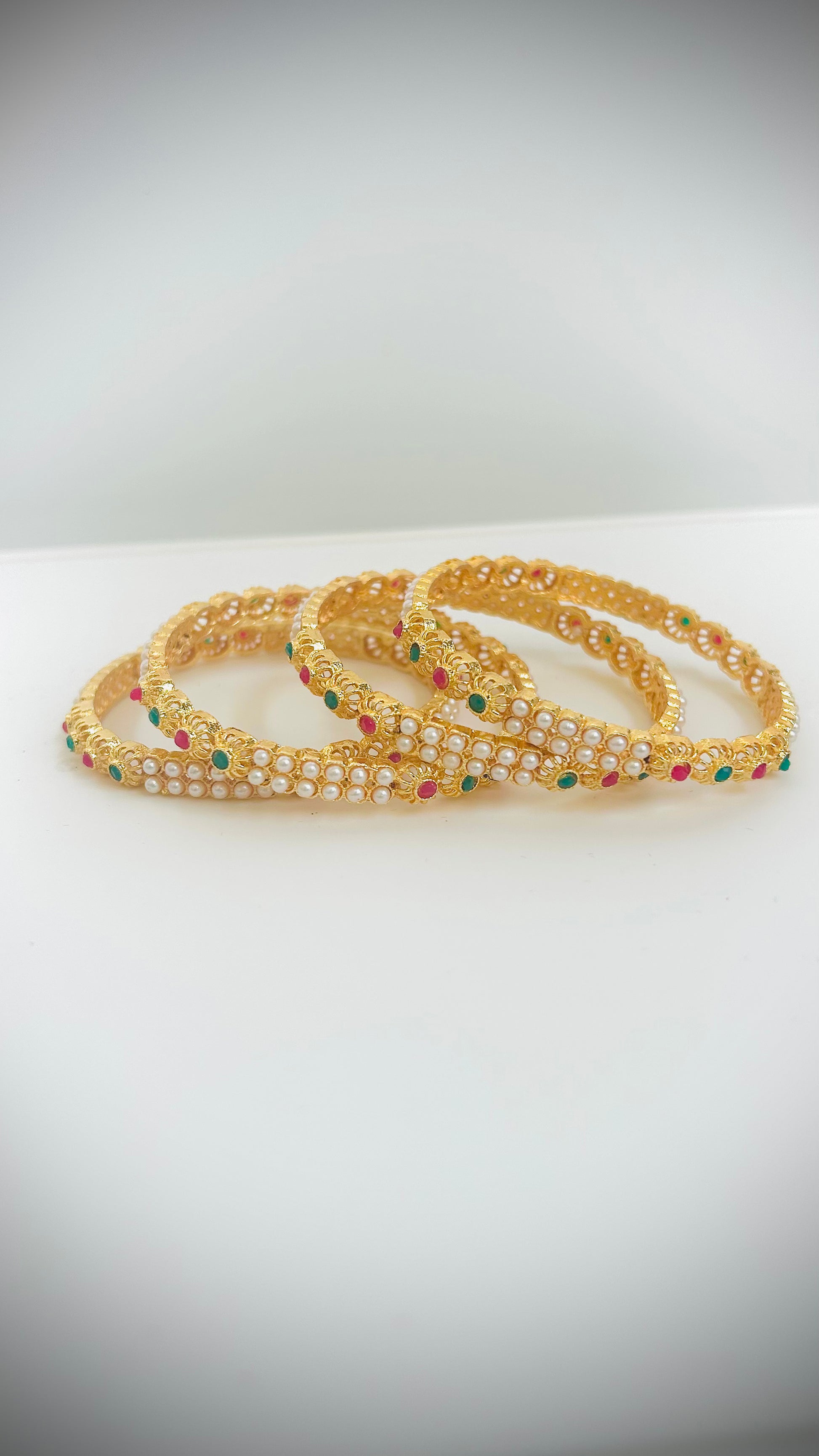 Pearl Gold Bangles with Red/Green Stones— Set of 4