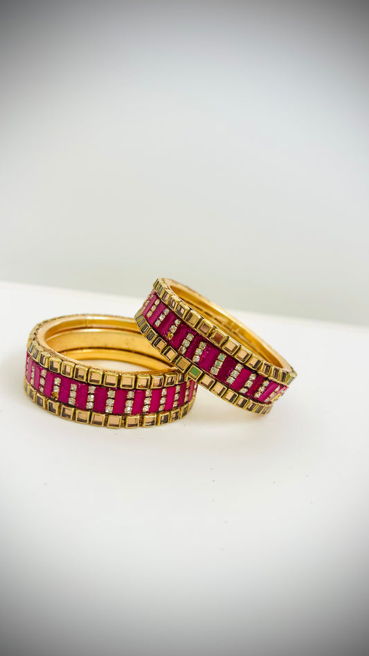 Set of 6 pink and gold desi bangles for children.