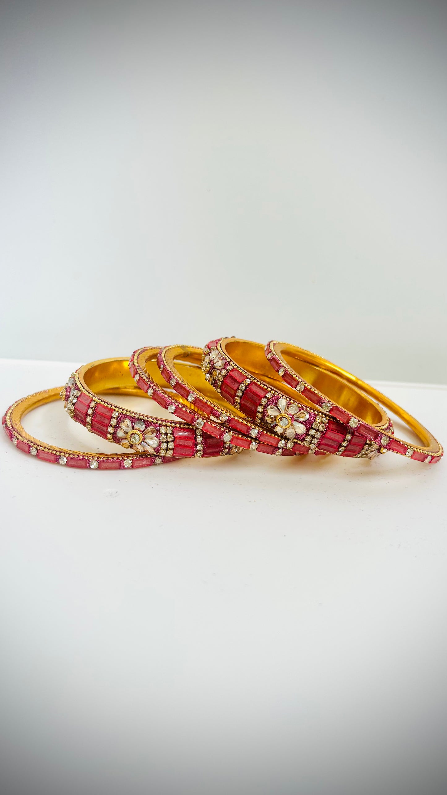 Set of 6 pink-gold bangles