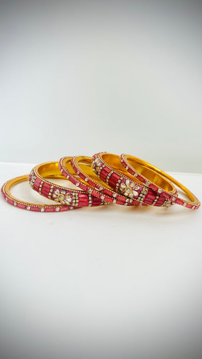 Set of 6 pink-gold bangles