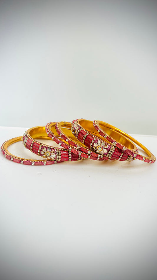 Set of 6 pink-gold bangles