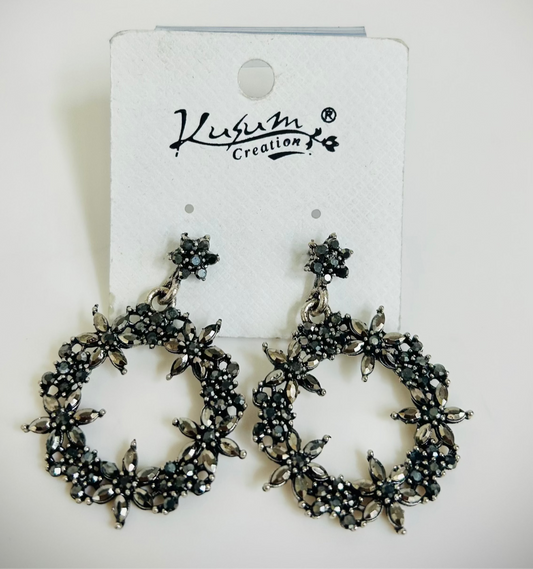 Silver-black metal hoop earrings with floral detailing – Indo-ethnic boho jewelry