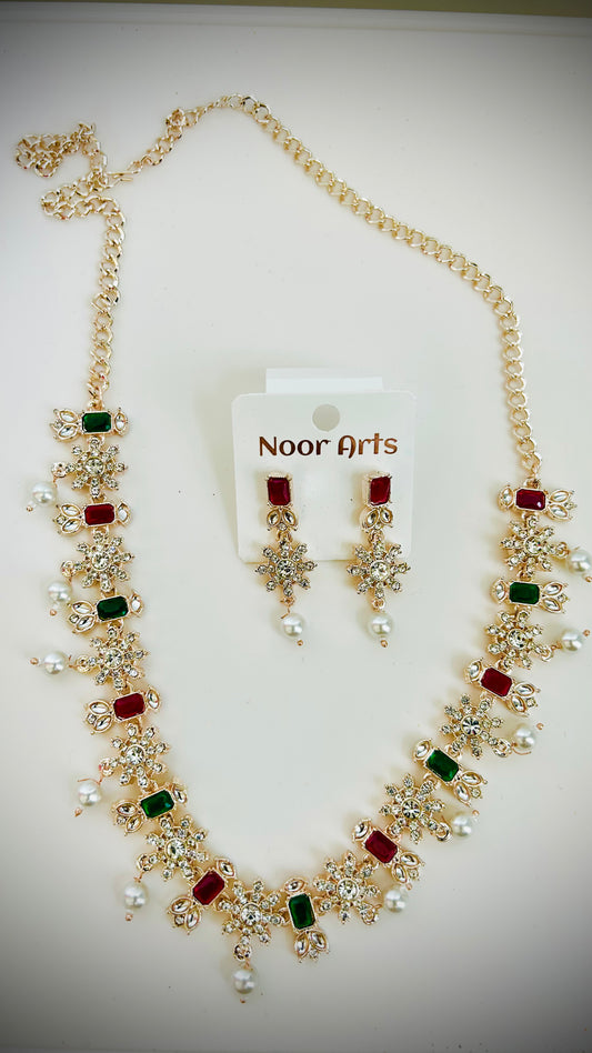Jewelry set with necklace and earrings on a white background, branded 'Noor Arts'.