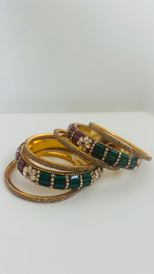 Gold, green, and maroon bangles