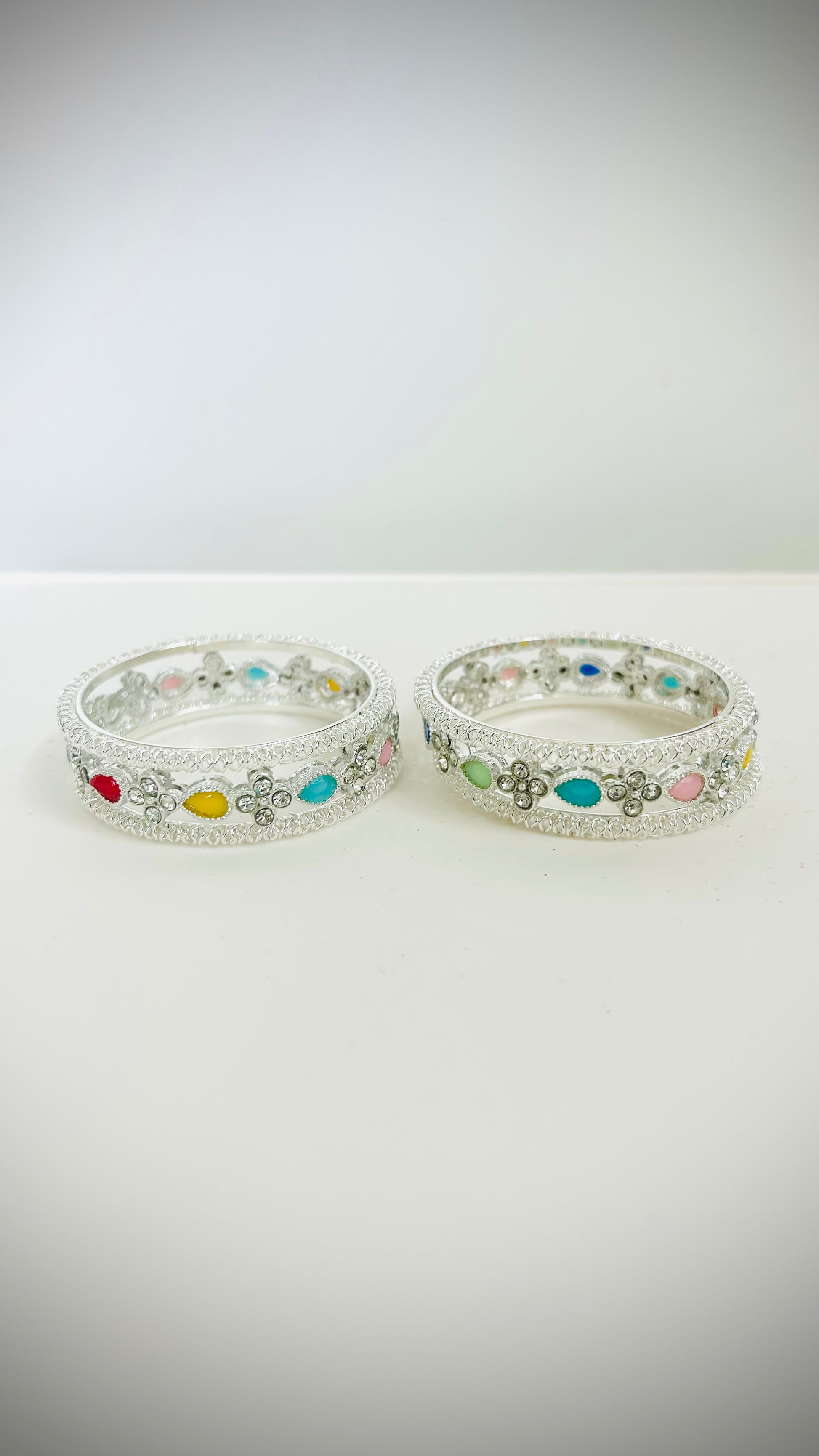 Kids' silver bangles with multicolored stones