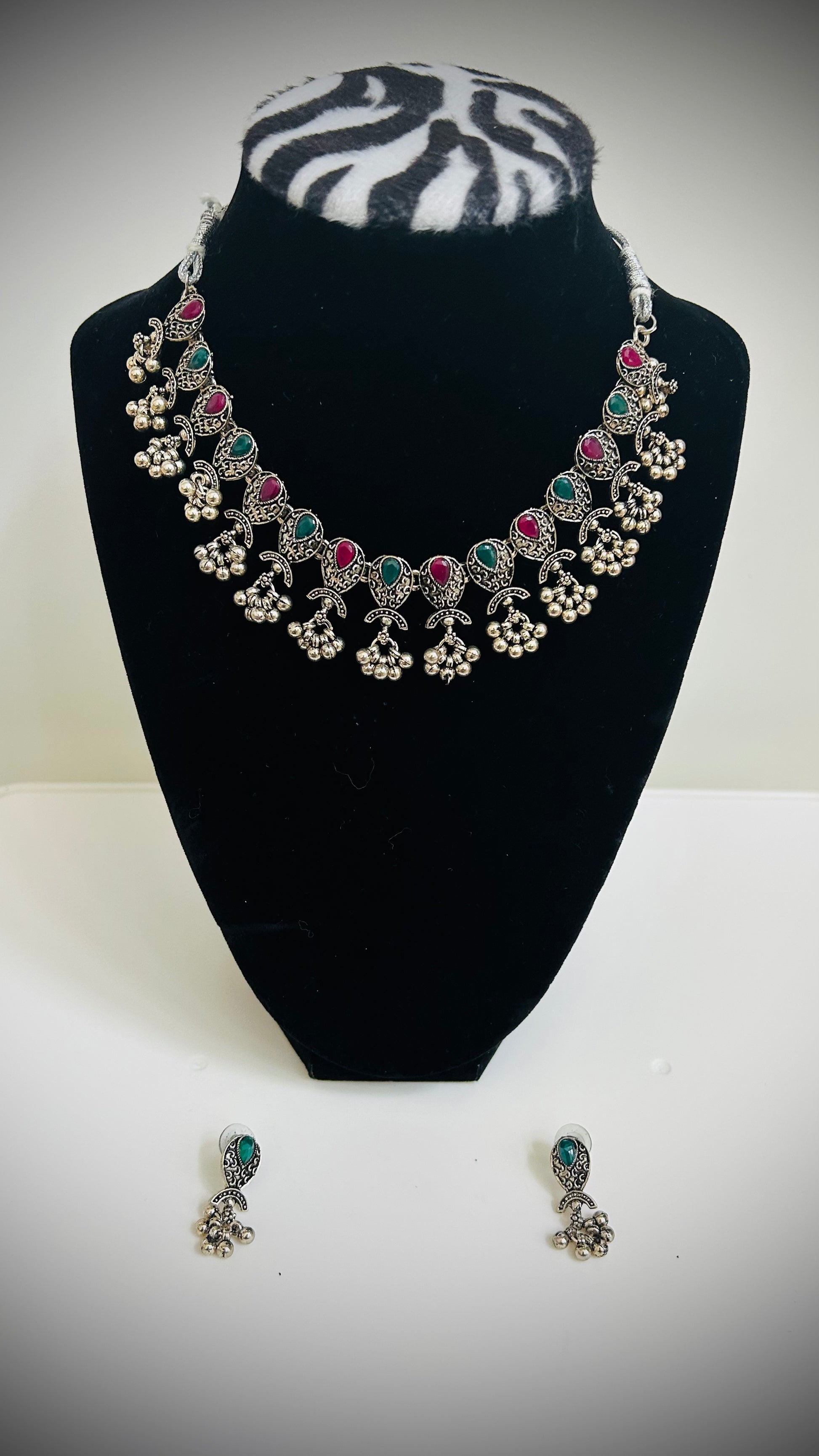 Traditional metal choker with floral design and red and green stones – ethnic Desi jewelry