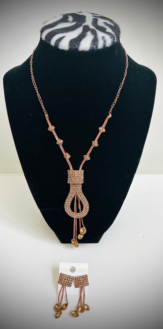 Peach-pink necklace with uniquely designed pendant and matching artistic earrings – Desi designer jewelry set