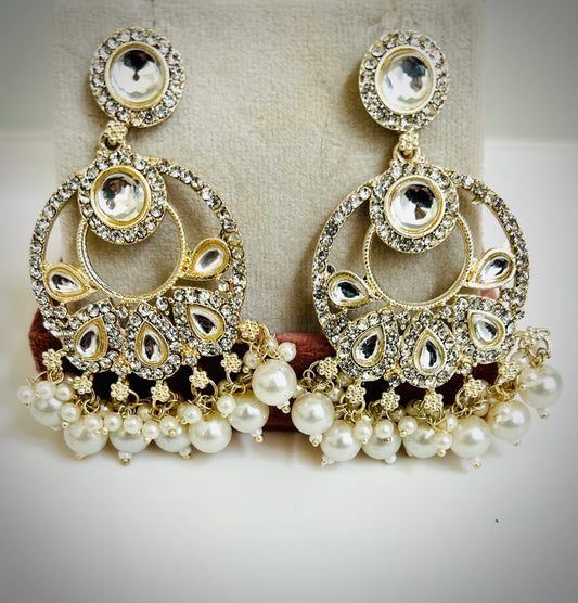 “White and silver jhumka earrings for partywear”