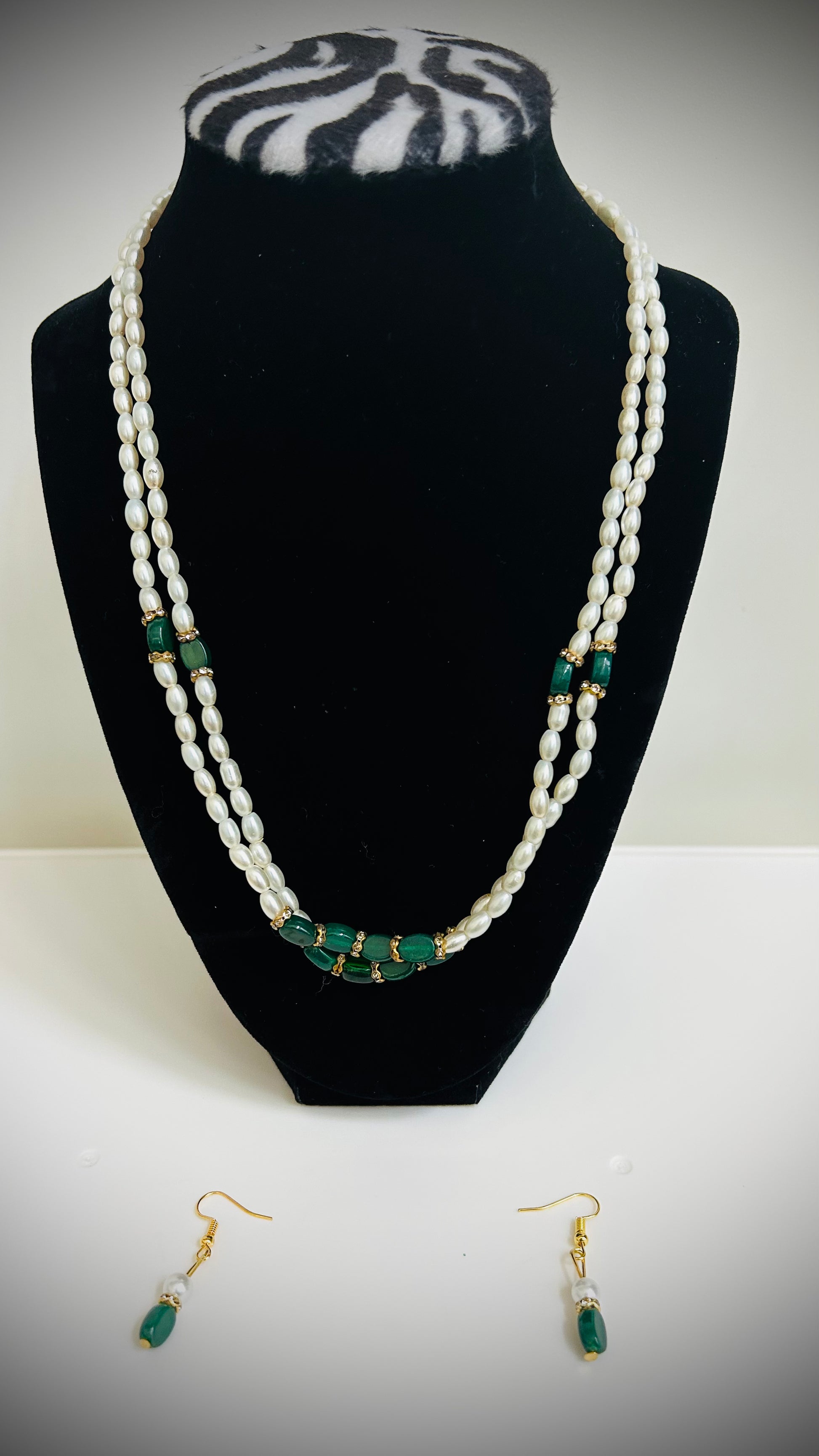 Double-layer white pearl necklace with green beads and matching green earrings – ethnic Desi jewelry set